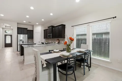 a view of a dining room with furniture