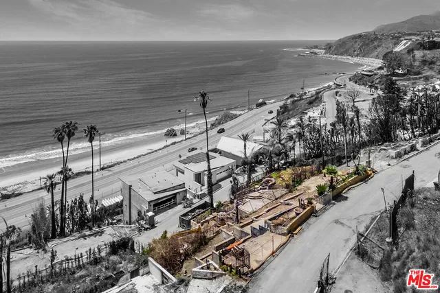 a view of a ocean with a mountain