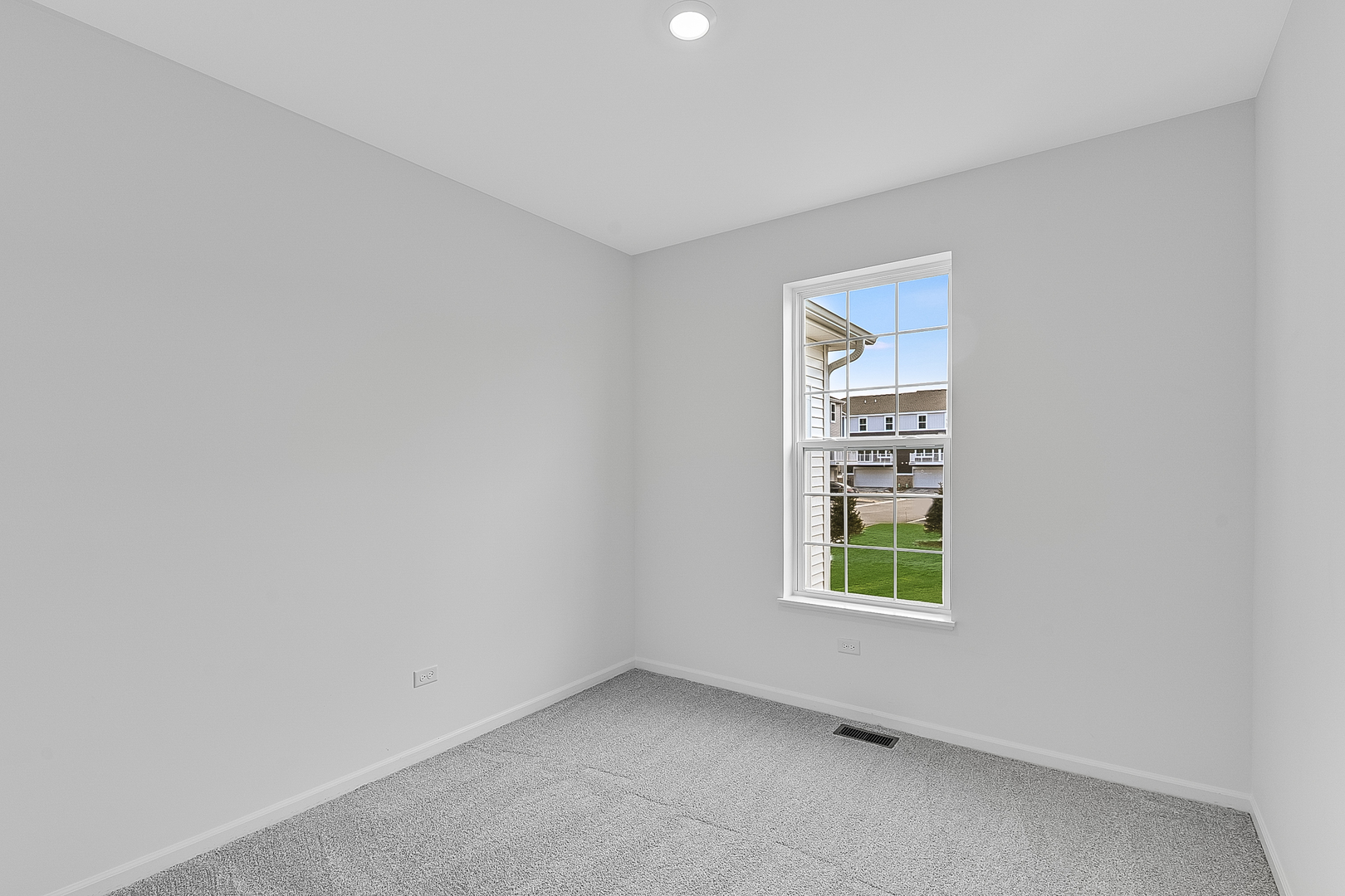 14905 South Mccarthy Circle Plainfield, IL 60544 - Photo 11 of 13 an empty room with windows