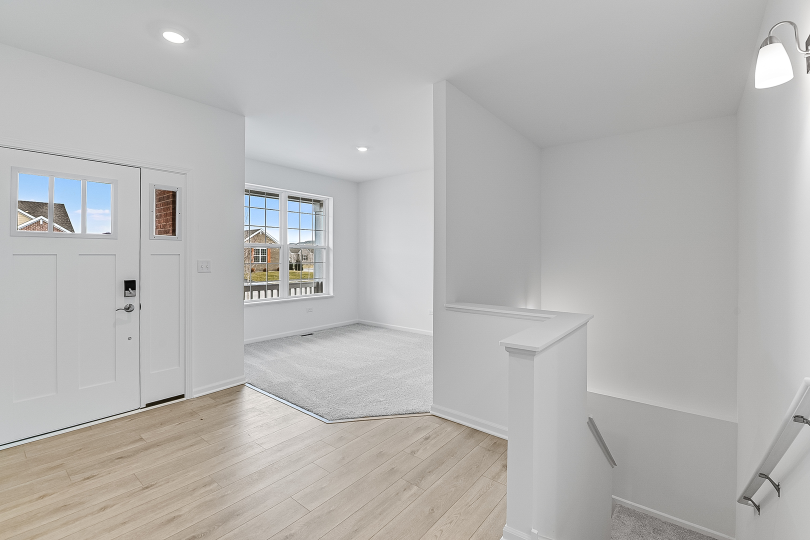 14905 South Mccarthy Circle Plainfield, IL 60544 - Photo 3 of 13 wooden floor in an empty room with a window