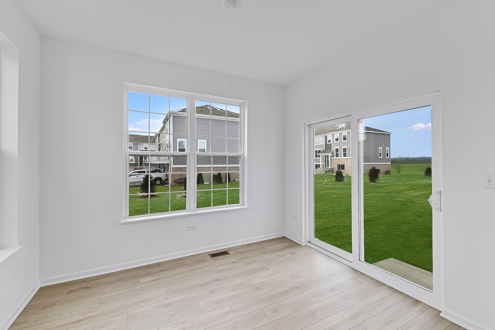 14905 South Mccarthy Circle Plainfield, IL 60544 - Photo 7 of 13 a view of an empty room with a window