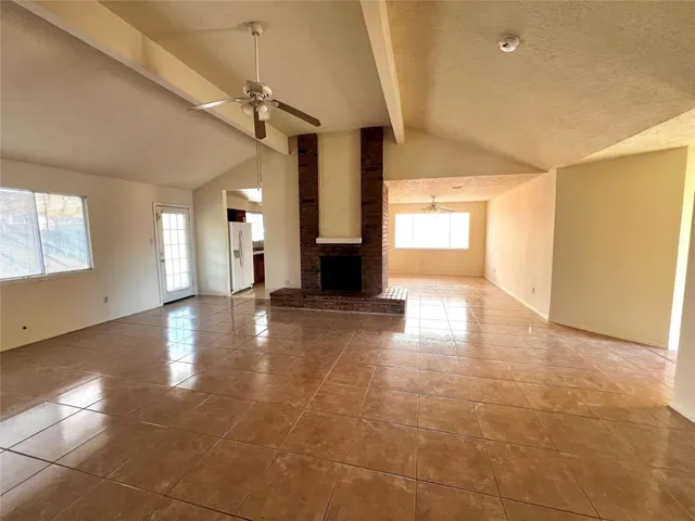 a view of a room with a fireplace