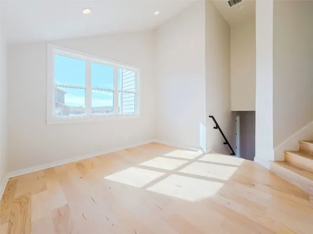 a white bath tub sitting next to a white toilet