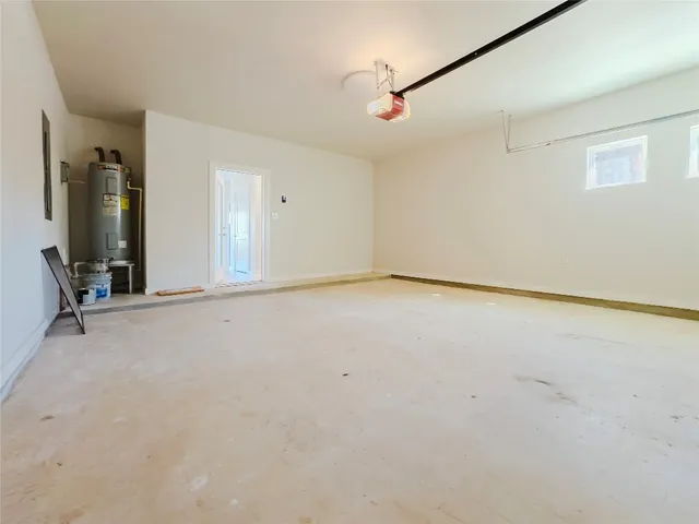 a view of empty room with windows