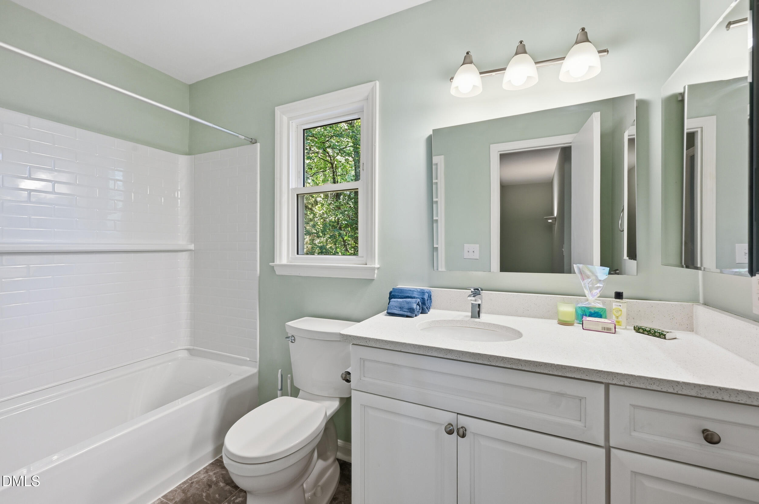 4 Little Spring Lane Durham, NC 27707 - Photo 20 of 34 a bathroom with a sink toilet tub and shower