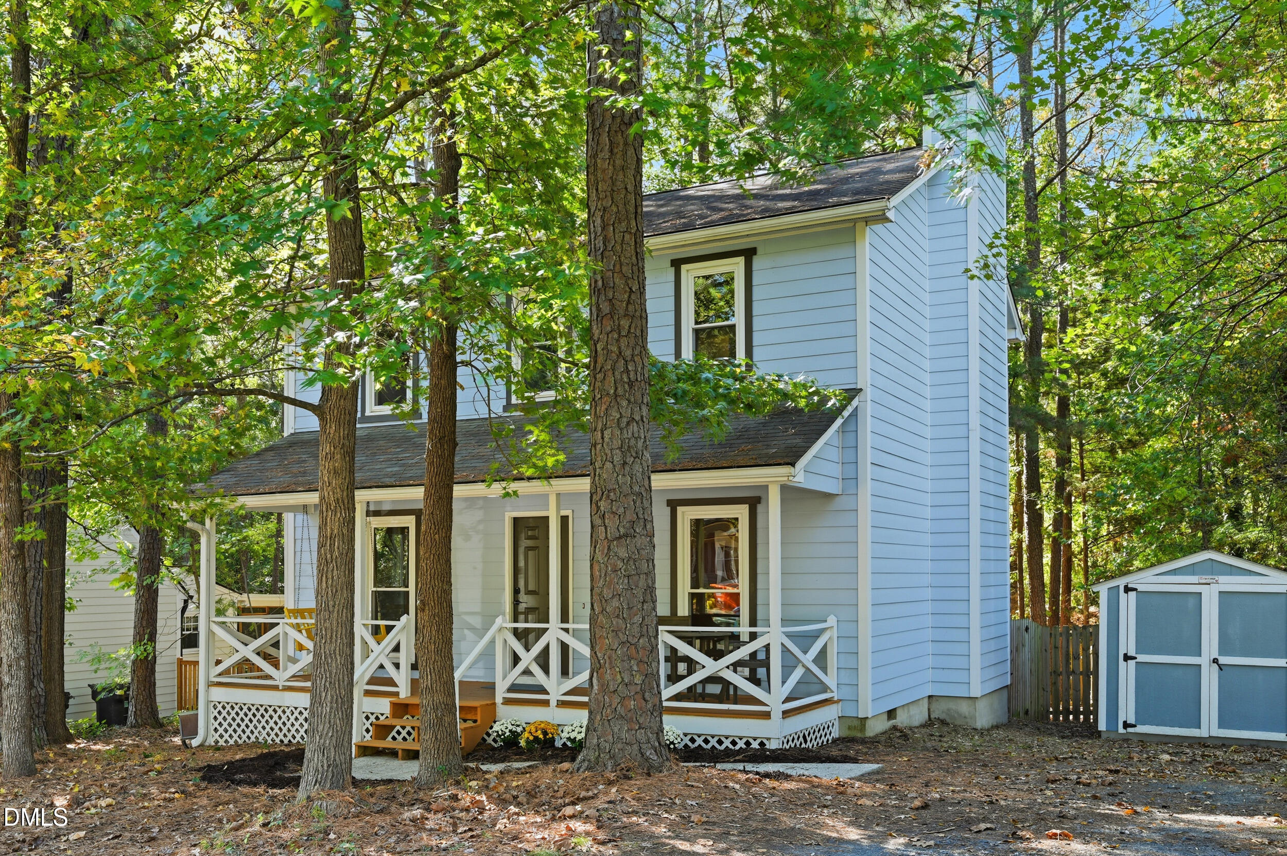 4 Little Spring Lane Durham, NC 27707 - Photo 2 of 34 a view of front of a house with large tree