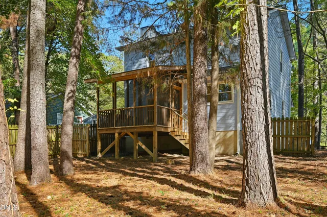 a view of backyard with green space