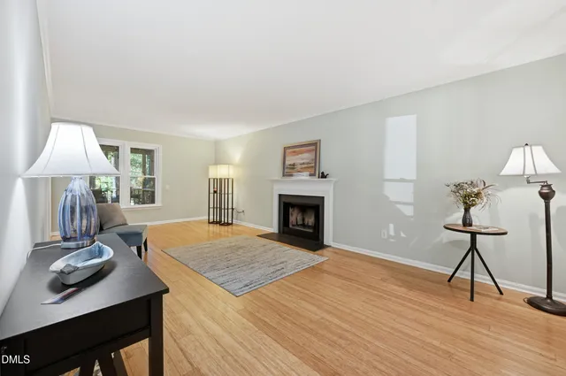 a view of a livingroom with furniture and wooden floor