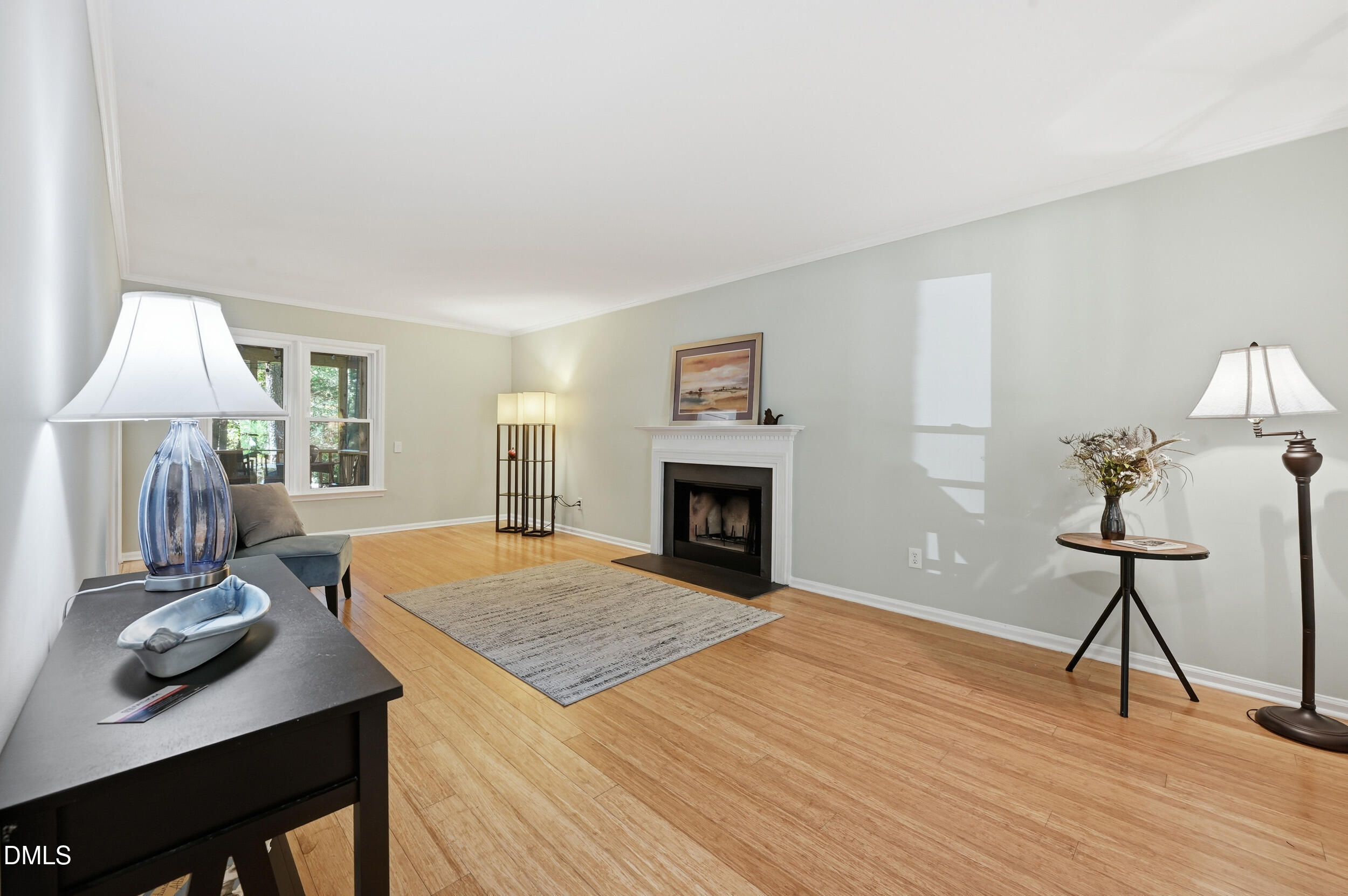 4 Little Spring Lane Durham, NC 27707 - Photo 5 of 34 a view of a livingroom with furniture and wooden floor