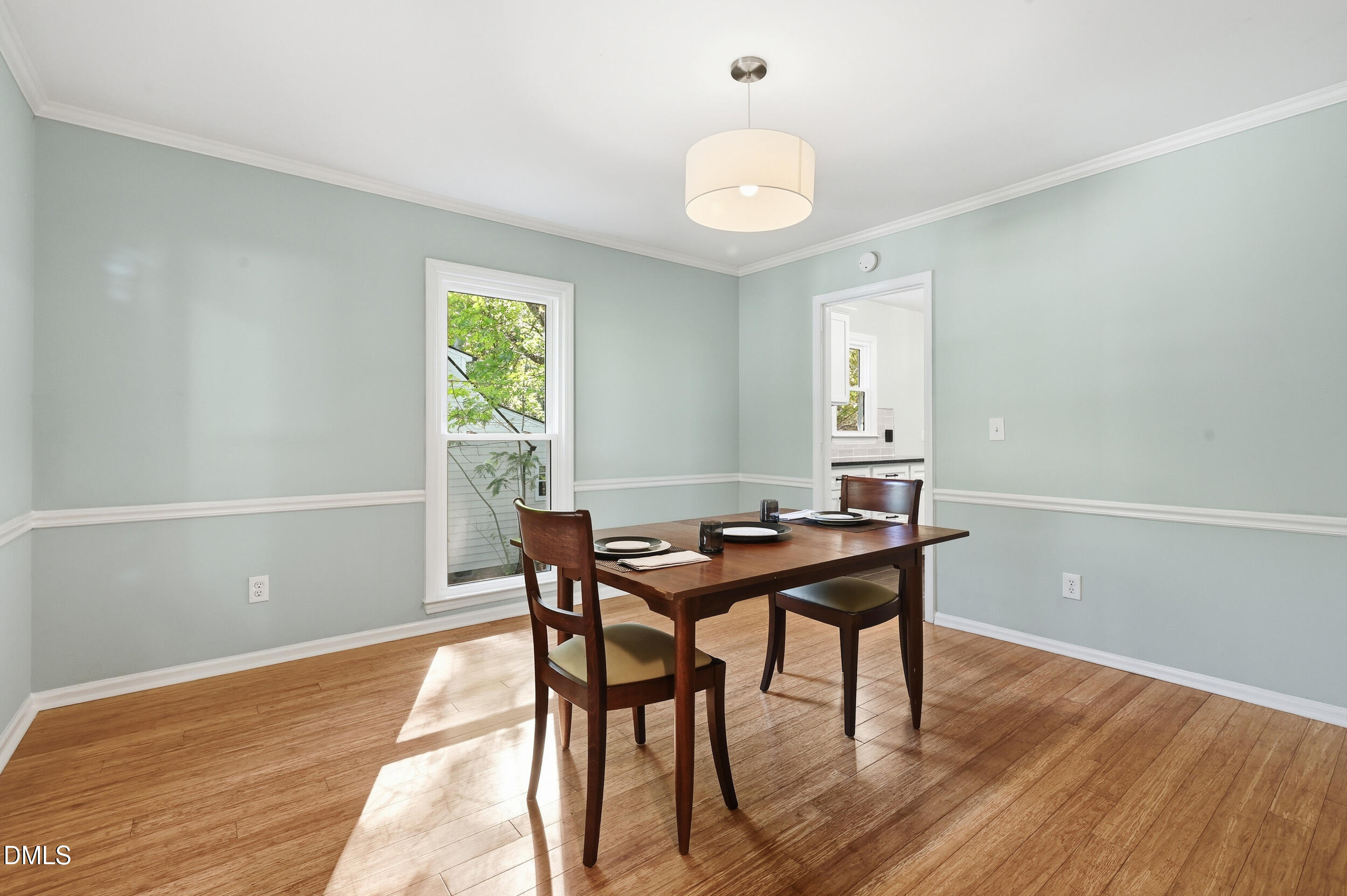 4 Little Spring Lane Durham, NC 27707 - Photo 7 of 34 a view of a dining room with furniture and wooden floor