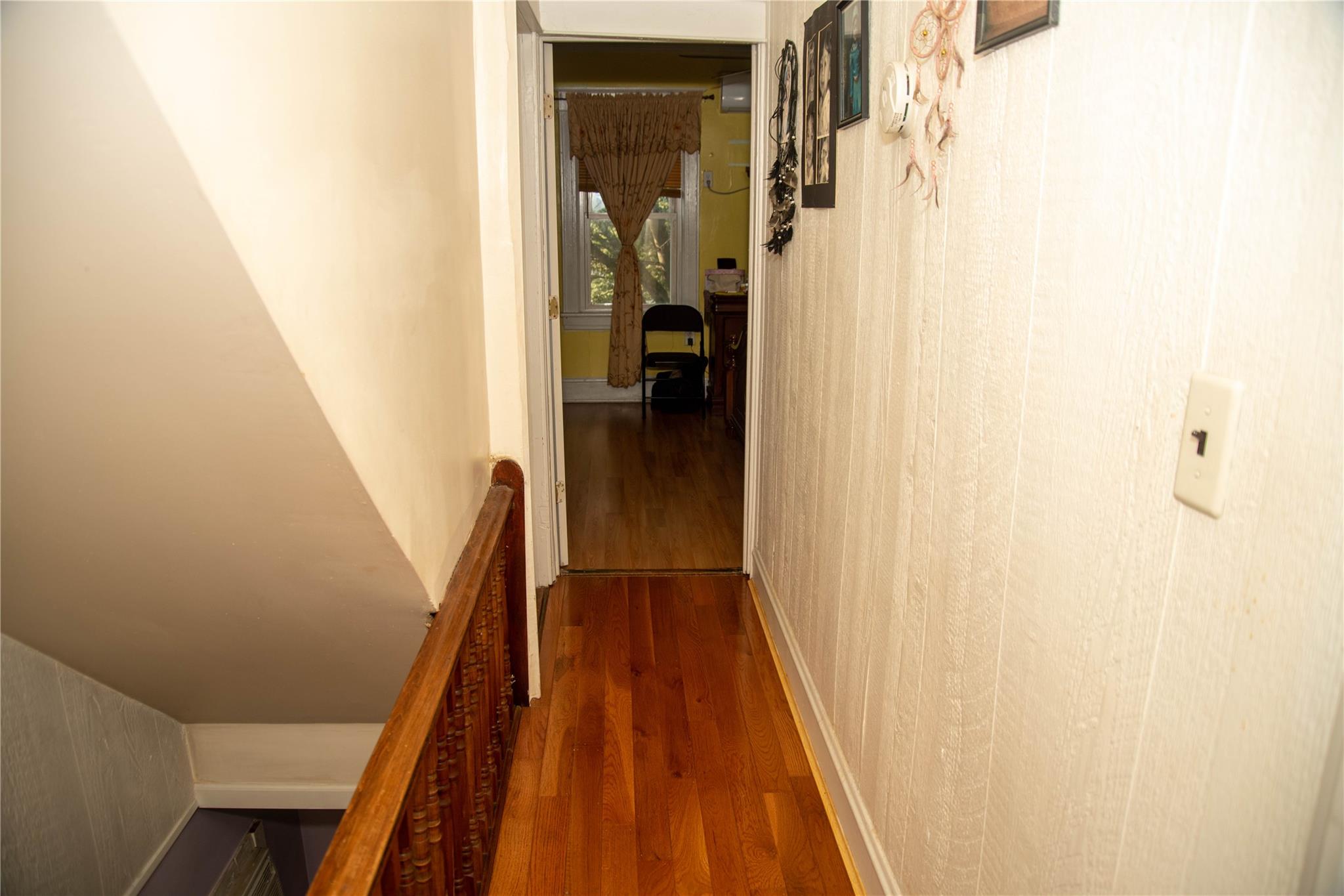 135-40 Alwick Road Queens, NY 11420 - Photo 23 of 38 a view of hallway with wooden floor