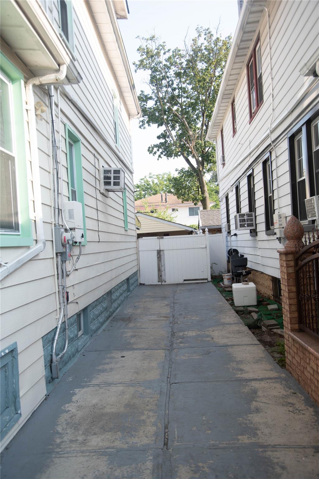 135-40 Alwick Road Queens, NY 11420 - Photo 36 of 38 a view of a back yard of the house