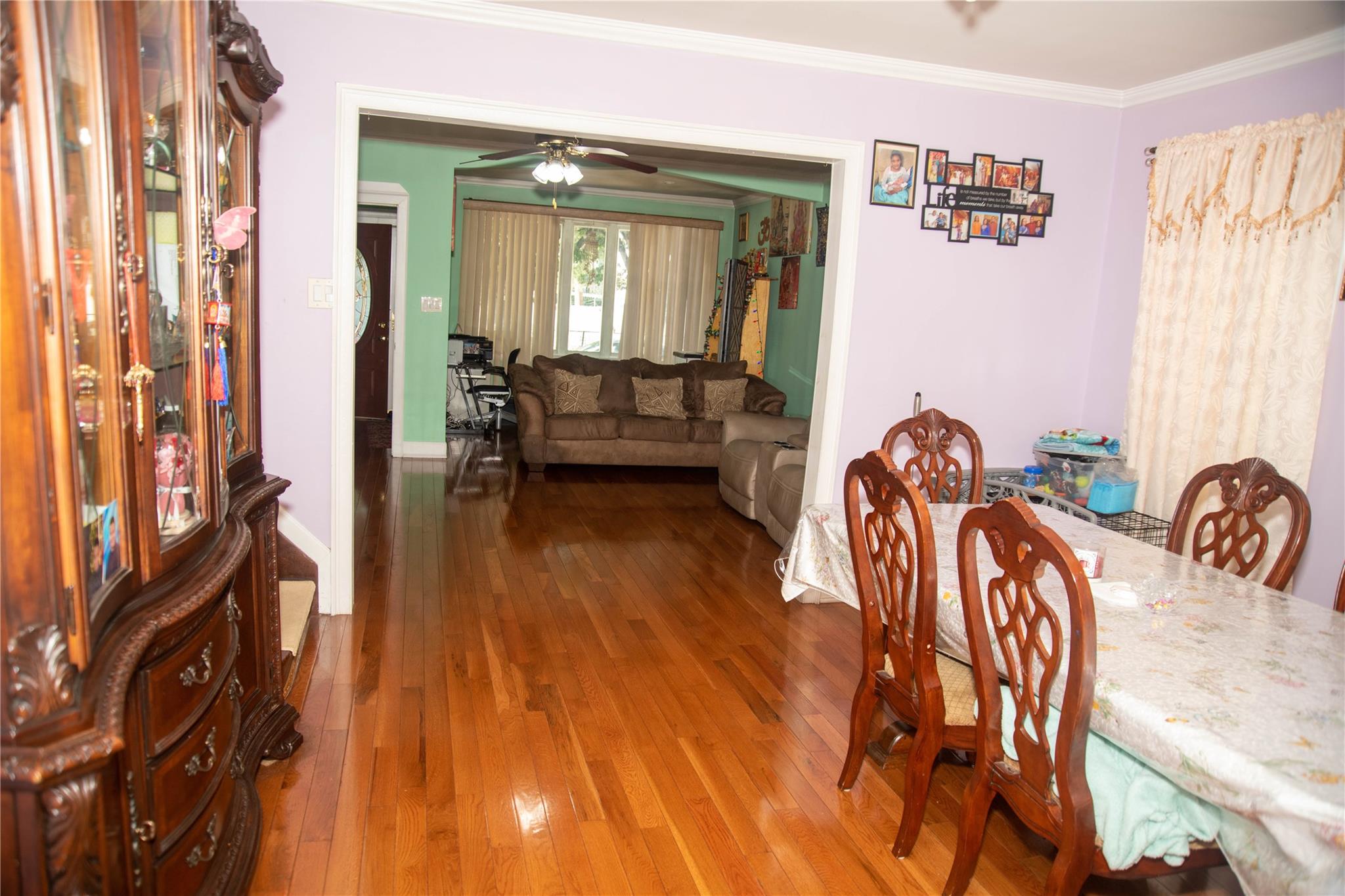135-40 Alwick Road Queens, NY 11420 - Photo 6 of 38 a view of a livingroom with furniture and hardwood floor
