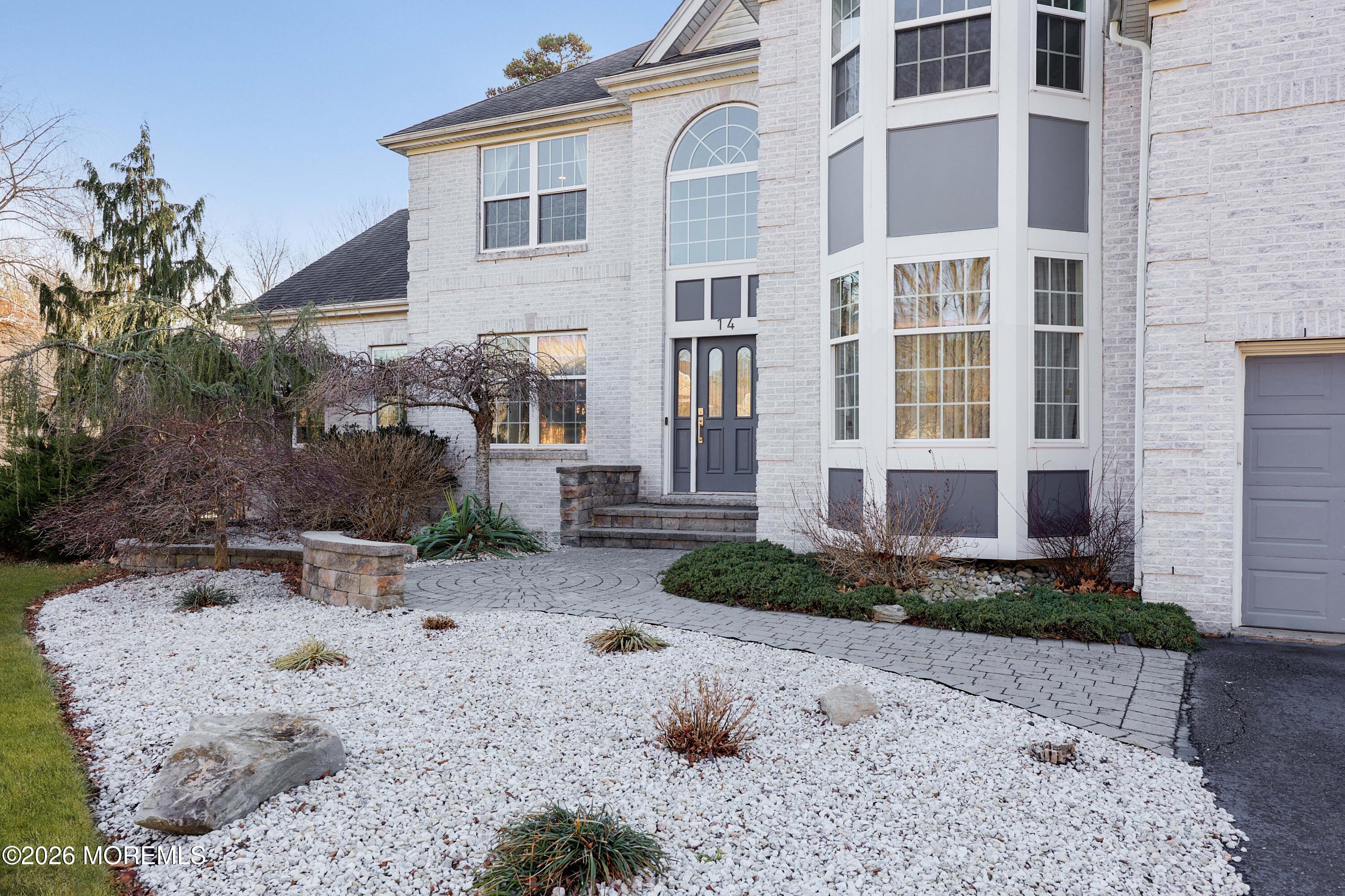14 Emily Road Manalapan, NJ 07726 - Photo 30 of 44 a view of a house with a yard