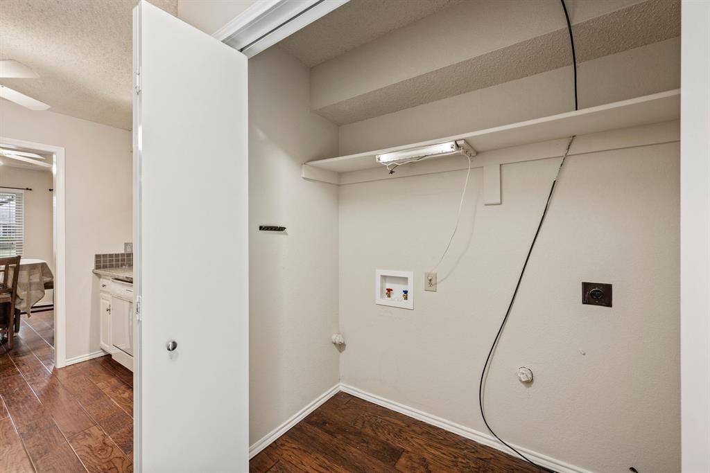 6605 Bluebonnet Drive Rowlett, TX 75089 - Photo 11 of 25 a view of a room with wooden floor