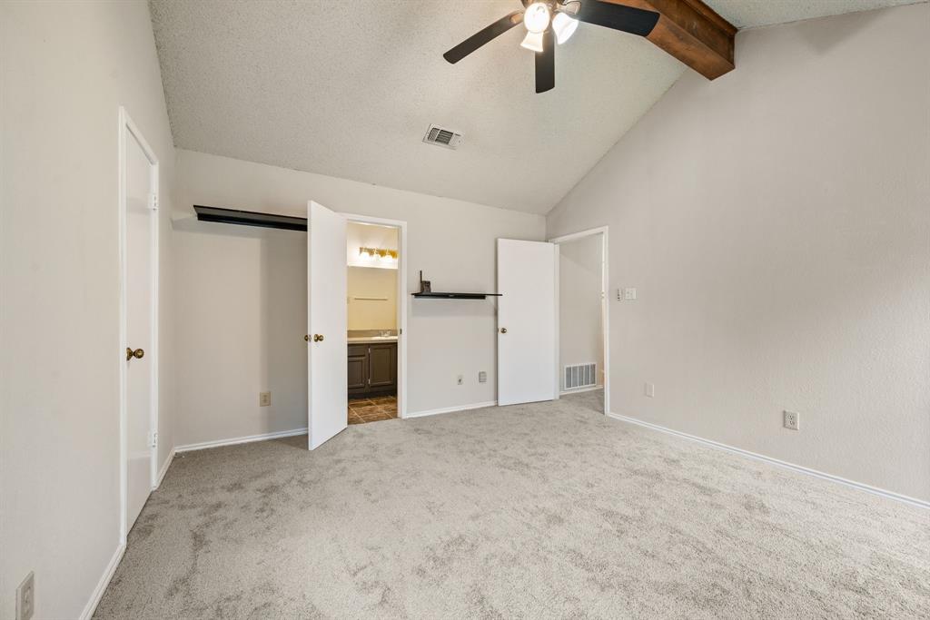 6605 Bluebonnet Drive Rowlett, TX 75089 - Photo 13 of 25 an empty room with a empty space and a ceiling fan