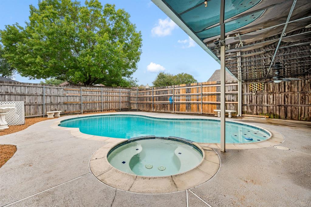 6605 Bluebonnet Drive Rowlett, TX 75089 - Photo 20 of 25 a view of outdoor space and swimming pool
