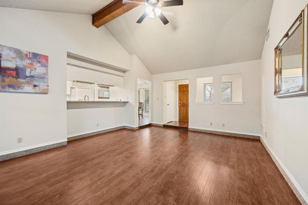 6605 Bluebonnet Drive Rowlett, TX 75089 - Photo 4 of 25 a view of empty room with wooden floor and fan