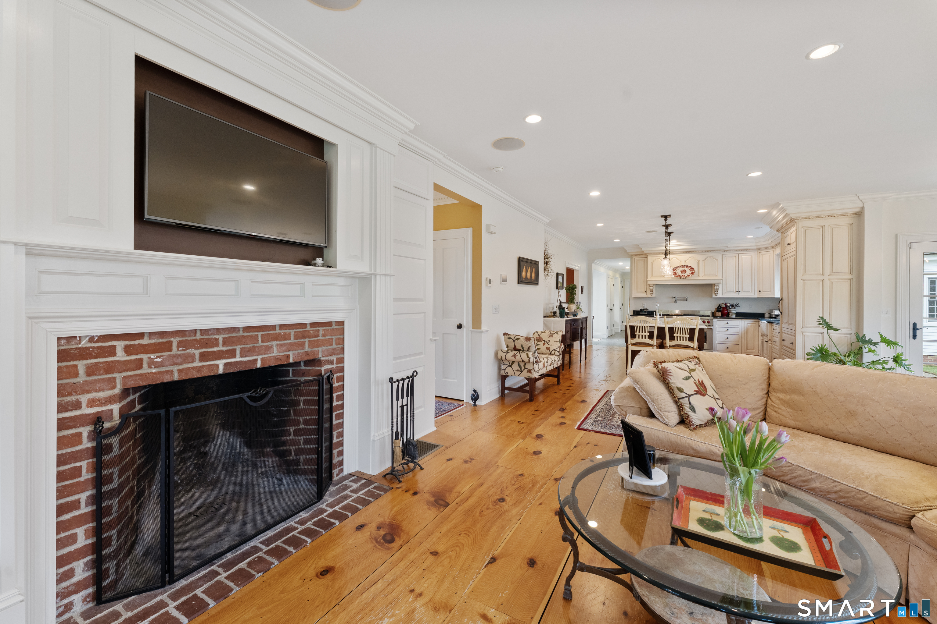 155 Paine Road Woodstock, CT 06281 - Photo 12 of 40 a living room with furniture and a fireplace