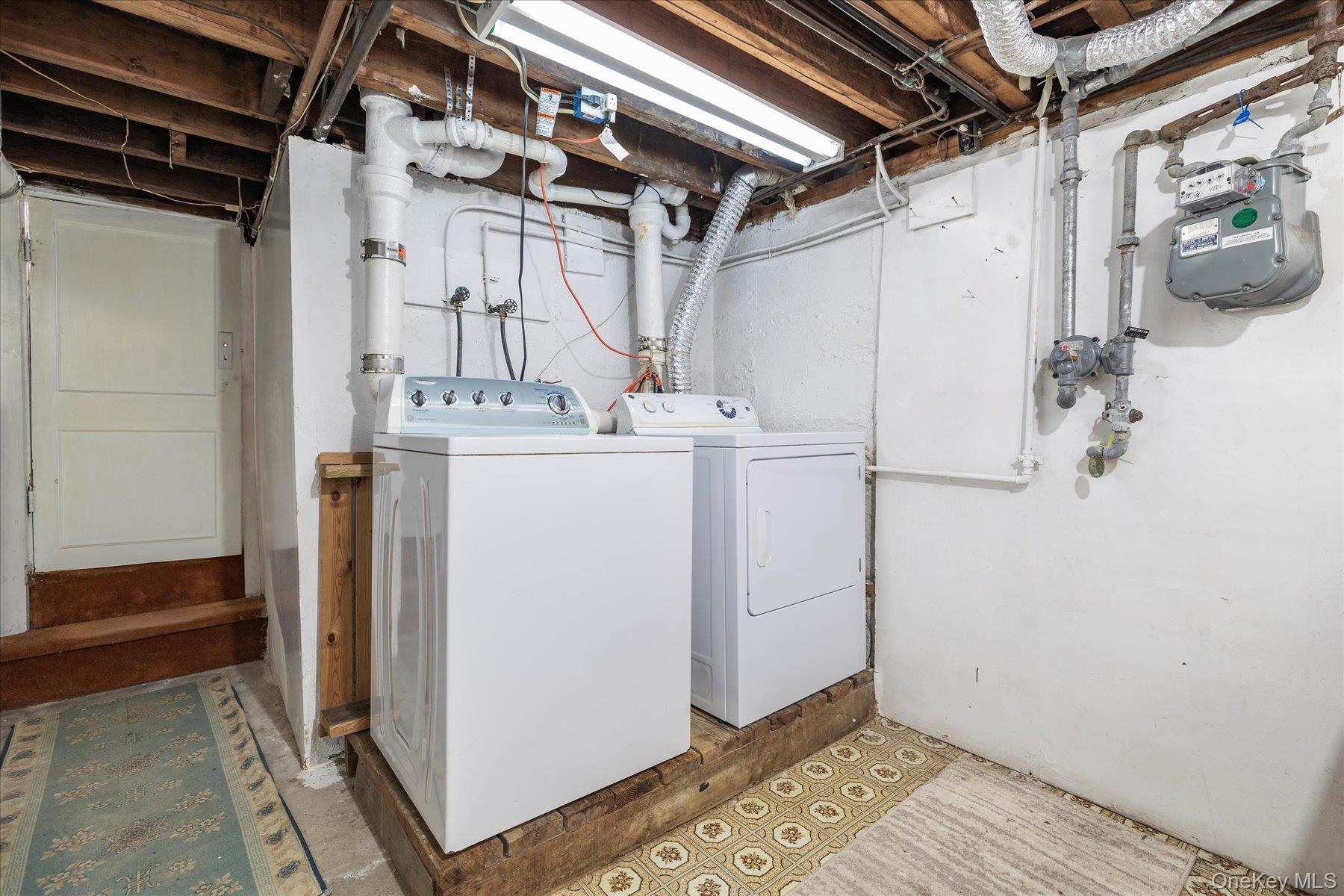 2934 Kinloch Road Wantagh, NY 11793 - Photo 23 of 30 Laundry area featuring washing machine and clothes dryer