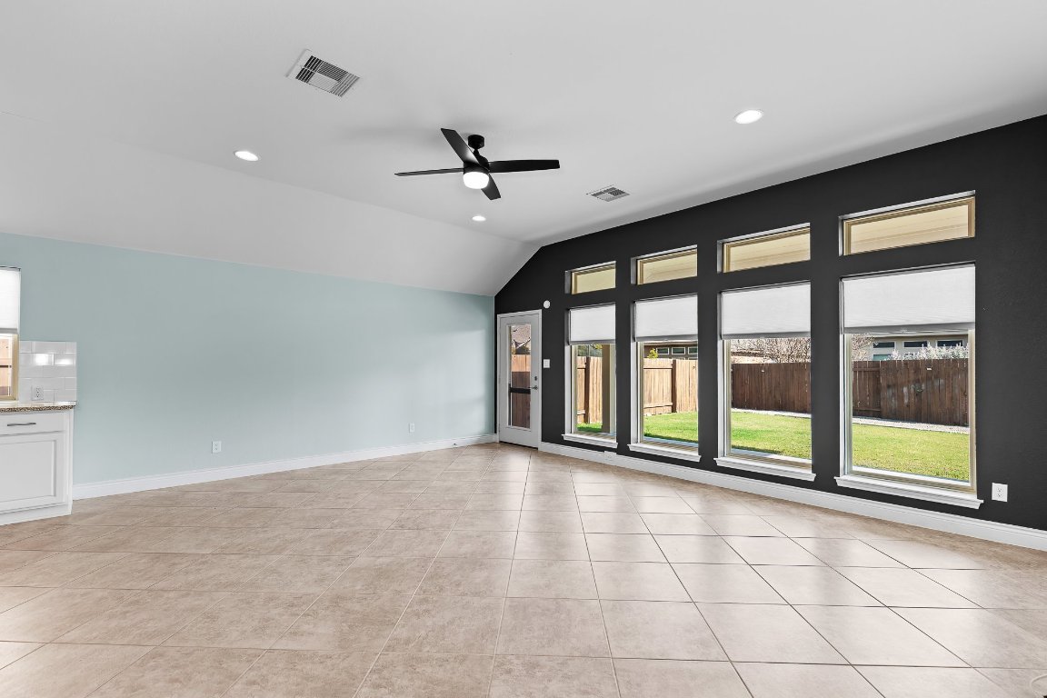 217 Serrano Street Georgetown, TX 78628 - Photo 15 of 27 a view of an empty room with a balcony