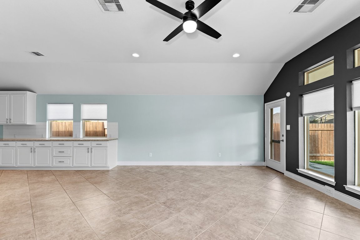 217 Serrano Street Georgetown, TX 78628 - Photo 16 of 27 a view of an empty room with a window