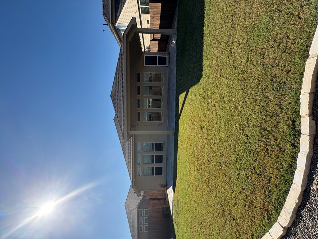 217 Serrano Street Georgetown, TX 78628 - Photo 27 of 27 a view of a house with a swimming pool