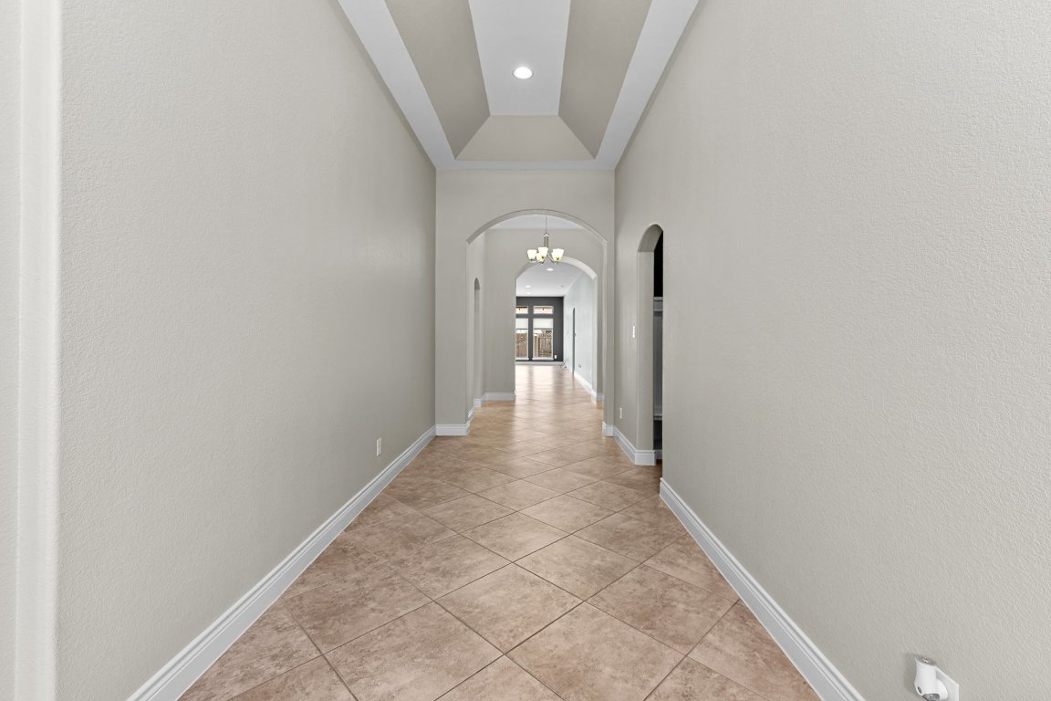 217 Serrano Street Georgetown, TX 78628 - Photo 3 of 27 a view of a hallway