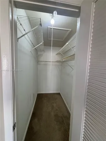 a view of a room with racks on the wall