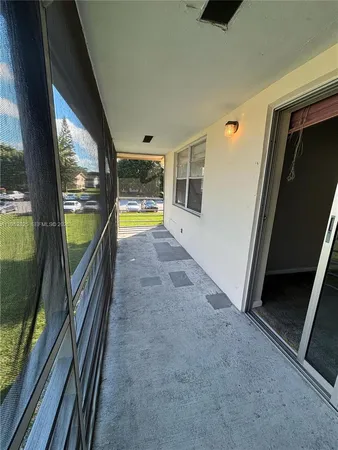 a view of a floor to ceiling window in a room