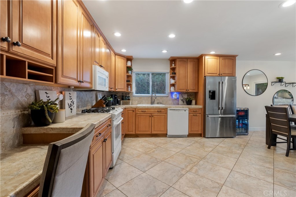 911 Diamond Road Placentia, CA 92870 - Photo 11 of 31 a kitchen with a sink cabinets and window