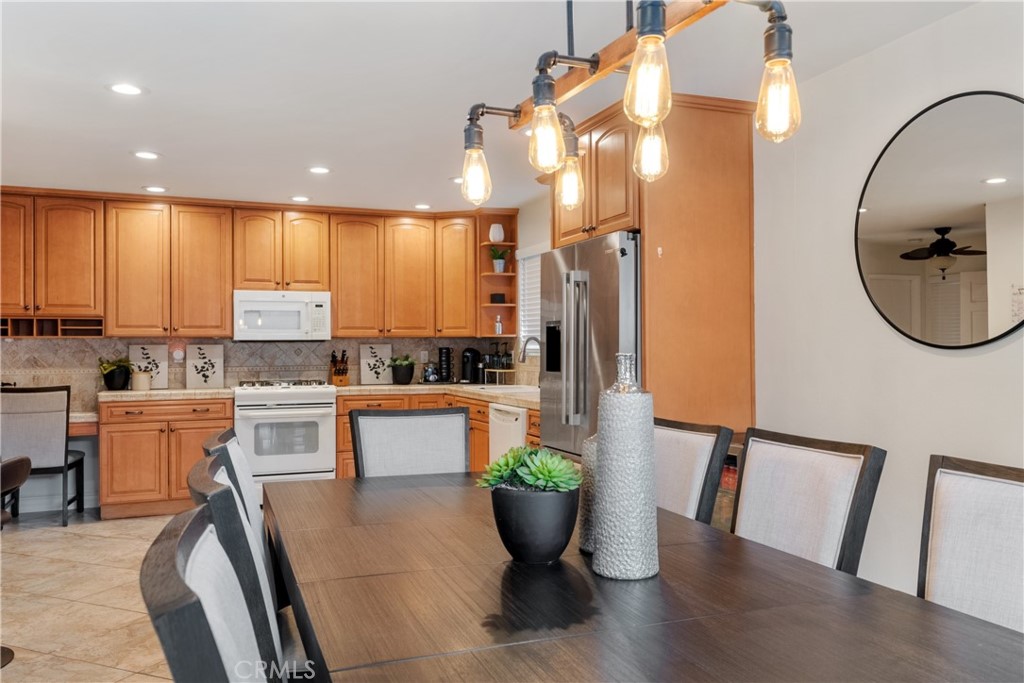 911 Diamond Road Placentia, CA 92870 - Photo 15 of 31 a kitchen with a table and chairs