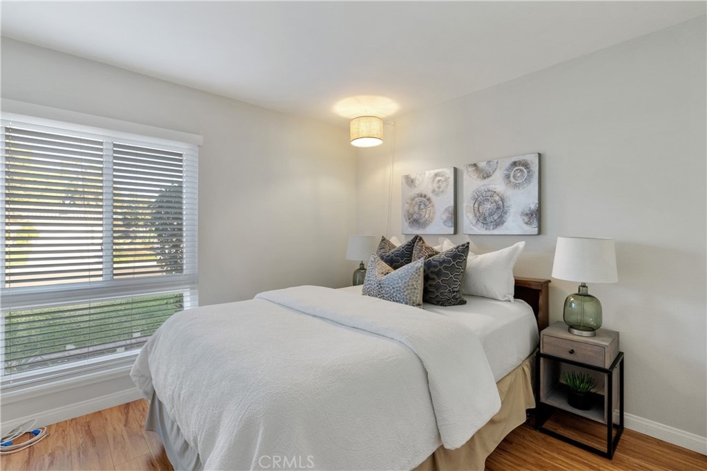 911 Diamond Road Placentia, CA 92870 - Photo 17 of 31 a bedroom with a bed and a window