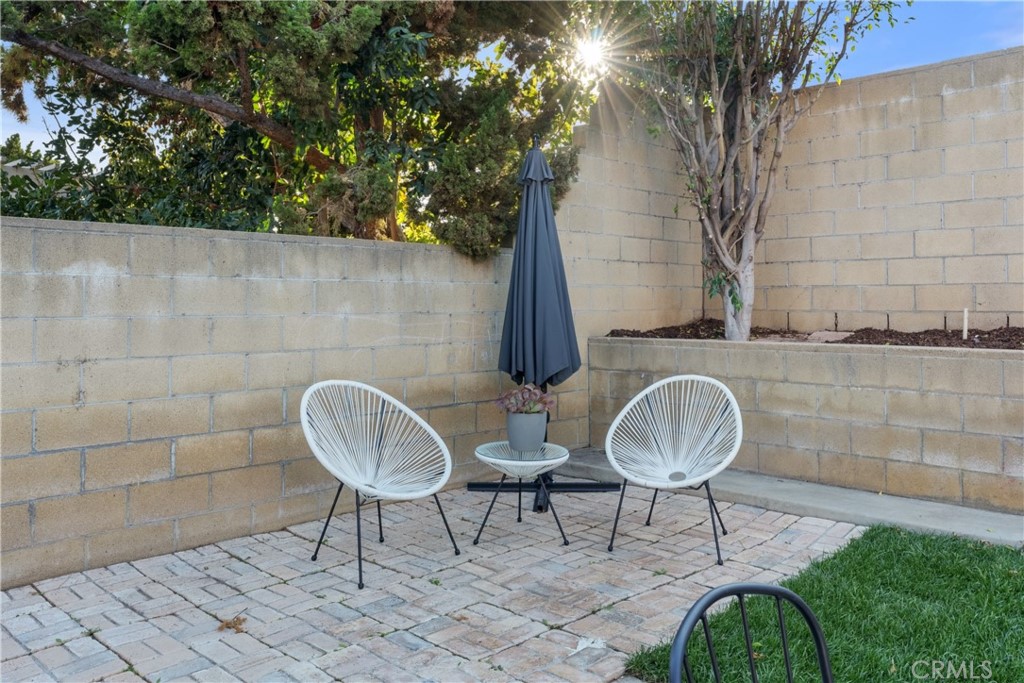 911 Diamond Road Placentia, CA 92870 - Photo 29 of 31 a front view of a house with backyard and sitting area