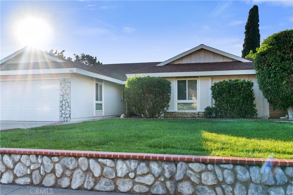 911 Diamond Road Placentia, CA 92870 - Photo 30 of 31 a view of a house with a yard