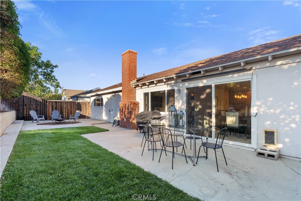 911 Diamond Road Placentia, CA 92870 - Photo 5 of 31 a view of a house with backyard sitting area and garden
