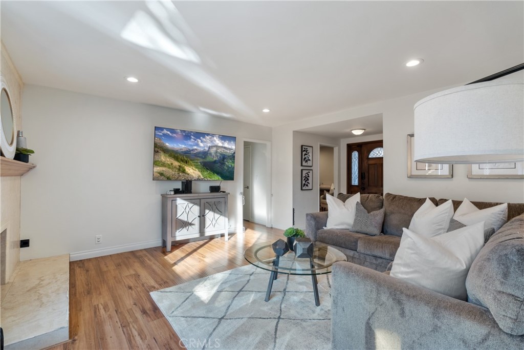 911 Diamond Road Placentia, CA 92870 - Photo 8 of 31 a living room with furniture and a wooden floor