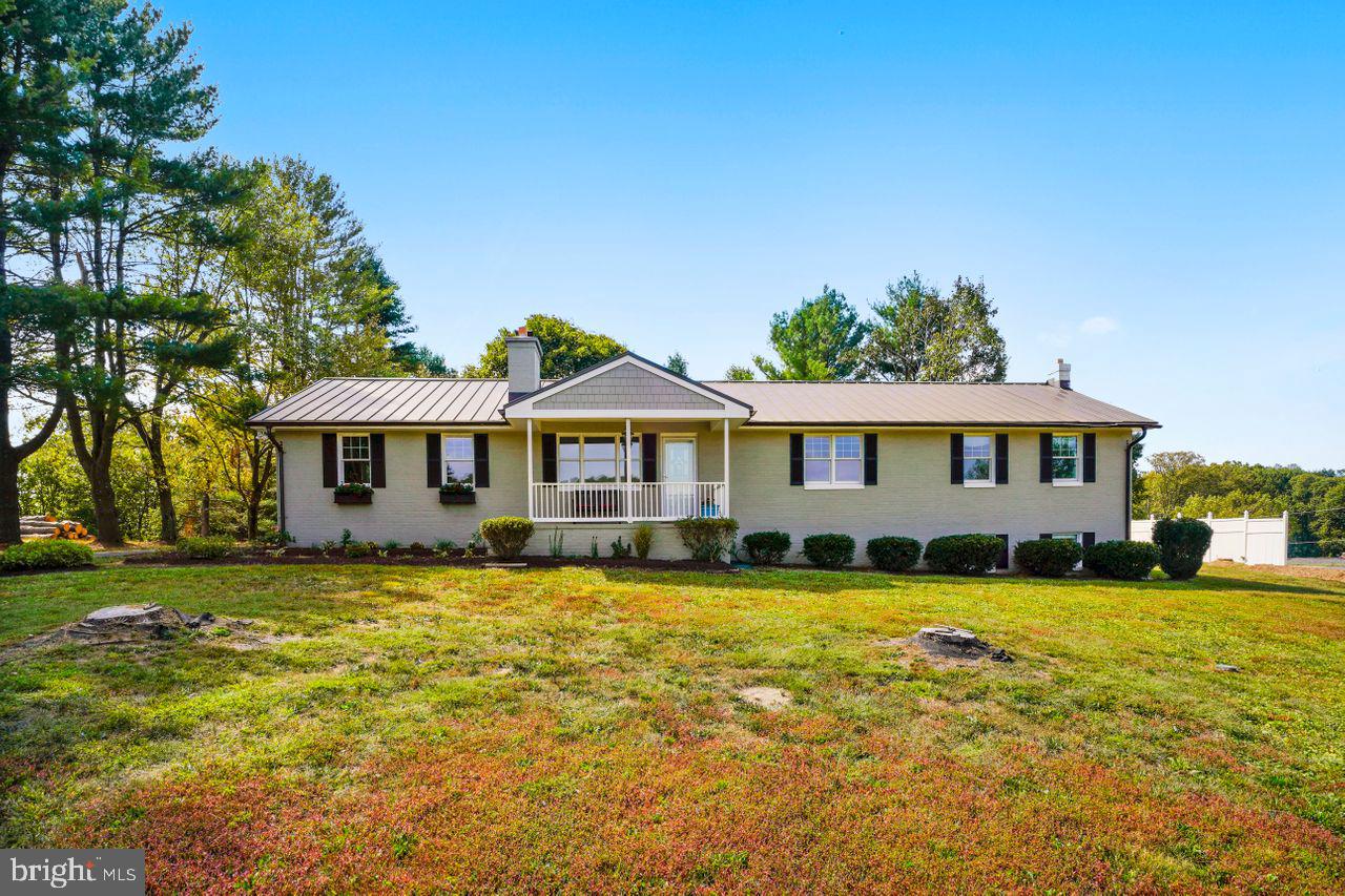 4330 Linthicum Road Dayton, MD 21036 - Photo 32 of 36 HardiePlank exterior with metal roof