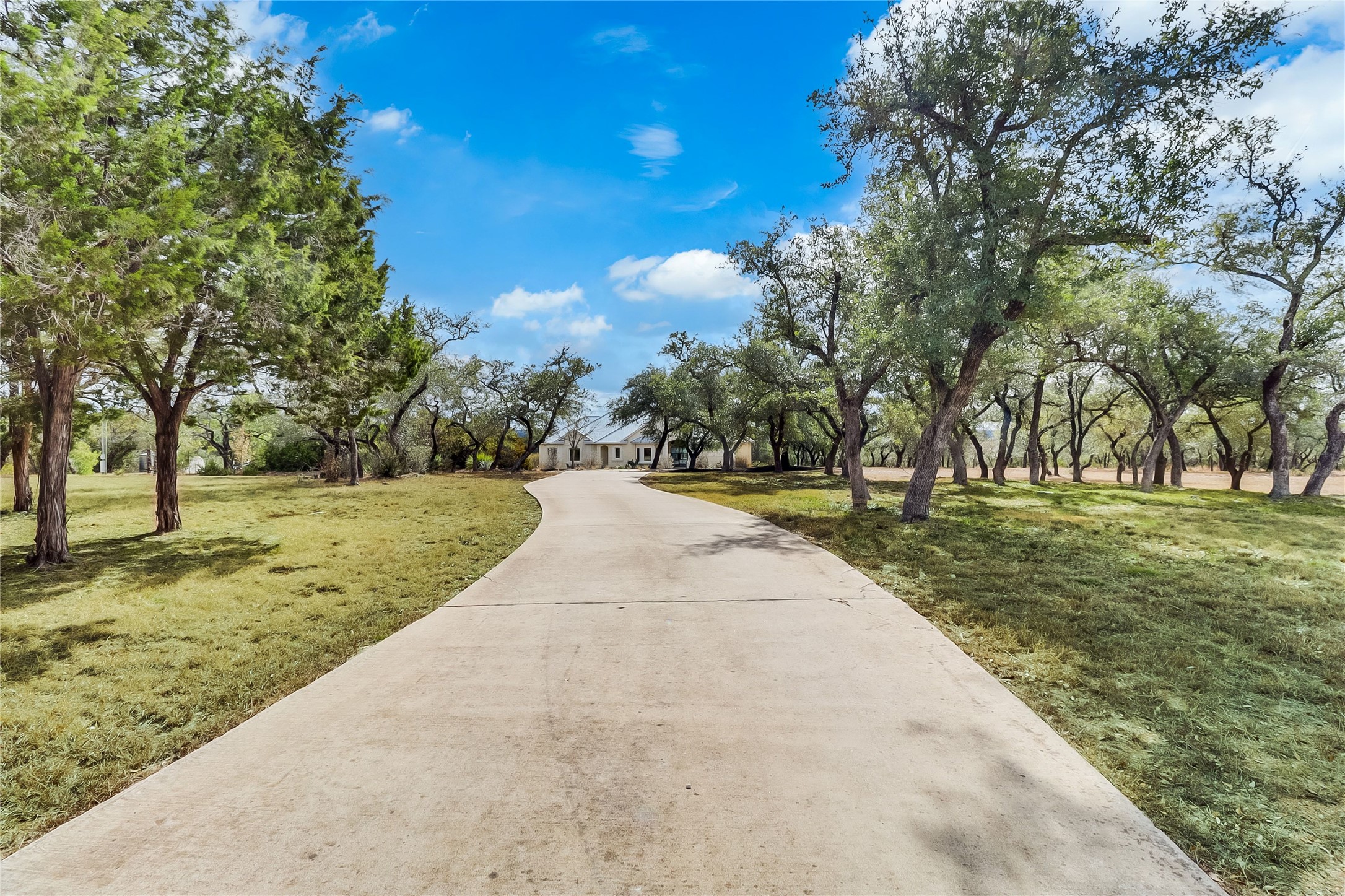 1100 Norwood Road Dripping Springs, TX 78620 - Photo 30 of 38 a view of outdoor space with garden