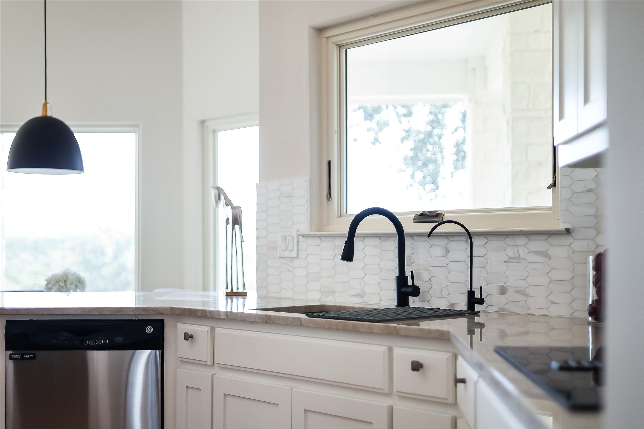 1100 Norwood Road Dripping Springs, TX 78620 - Photo 8 of 38 a close view of sink and tap