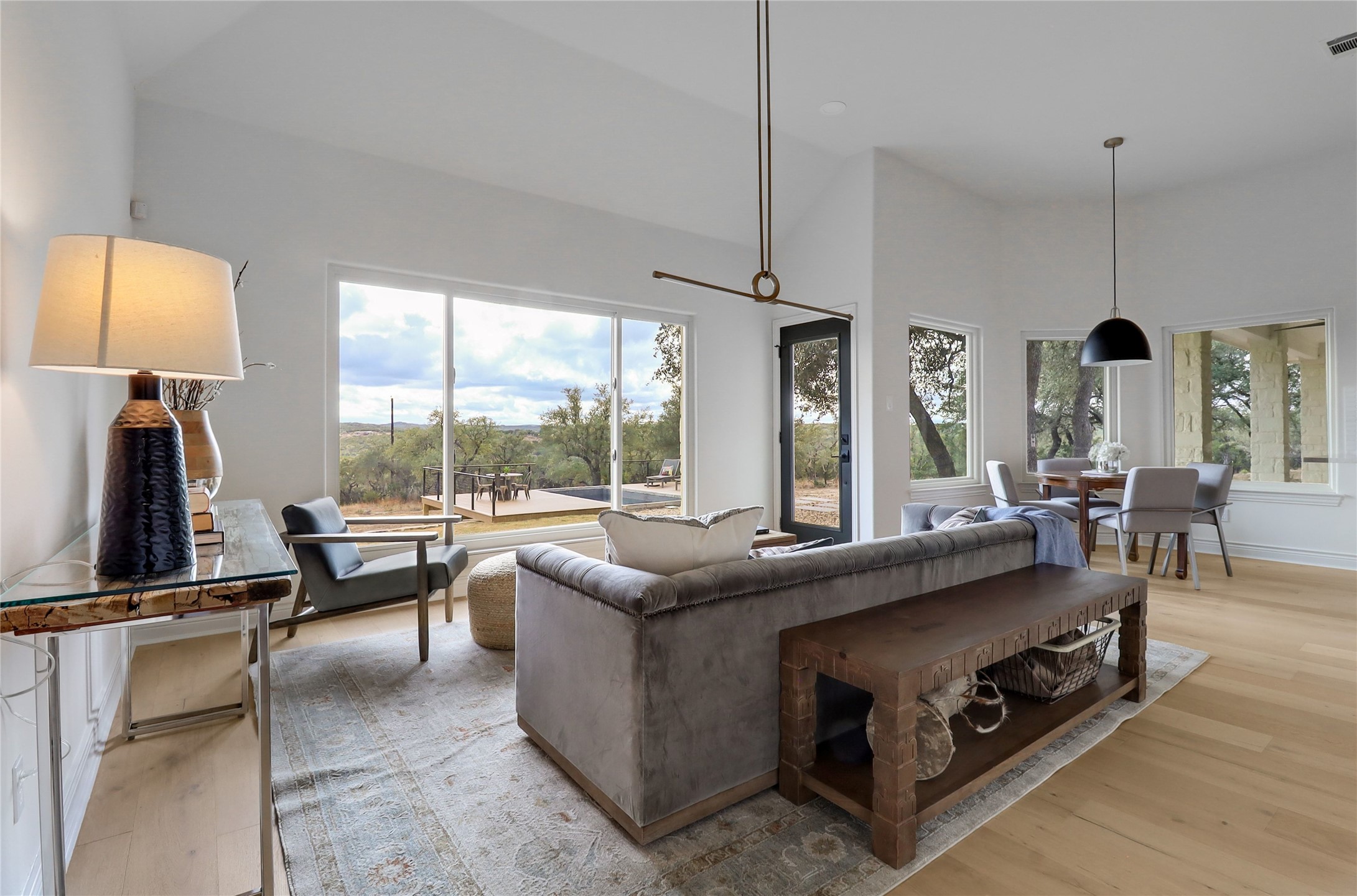 1100 Norwood Road Dripping Springs, TX 78620 - Photo 10 of 38 a living room with furniture and a flat screen tv