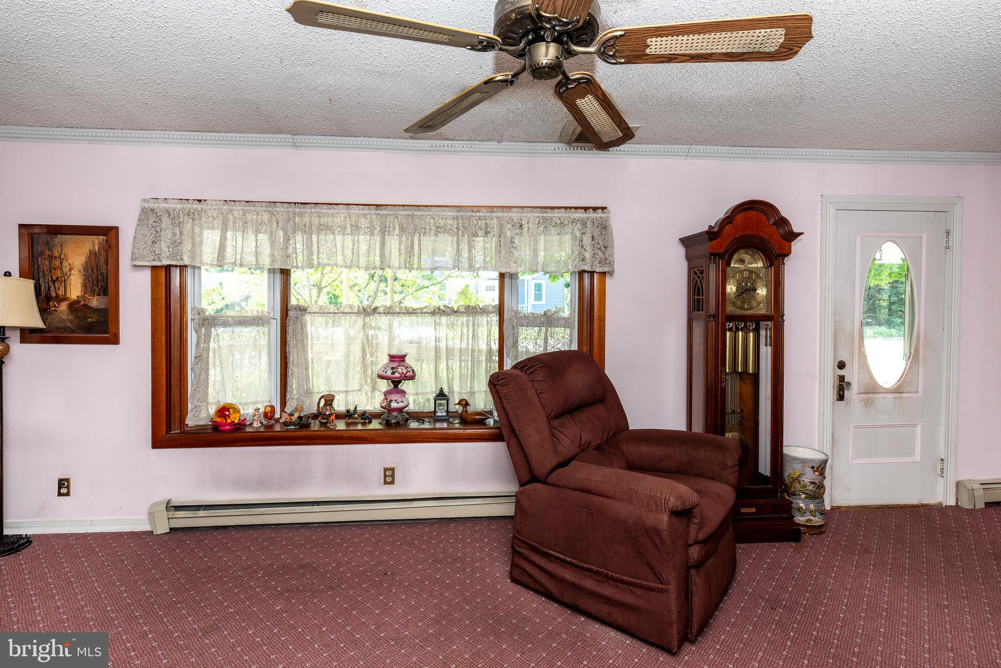 9516 Highland Street Mauricetown, NJ 08329 - Photo 11 of 53 a living room with furniture and a large window