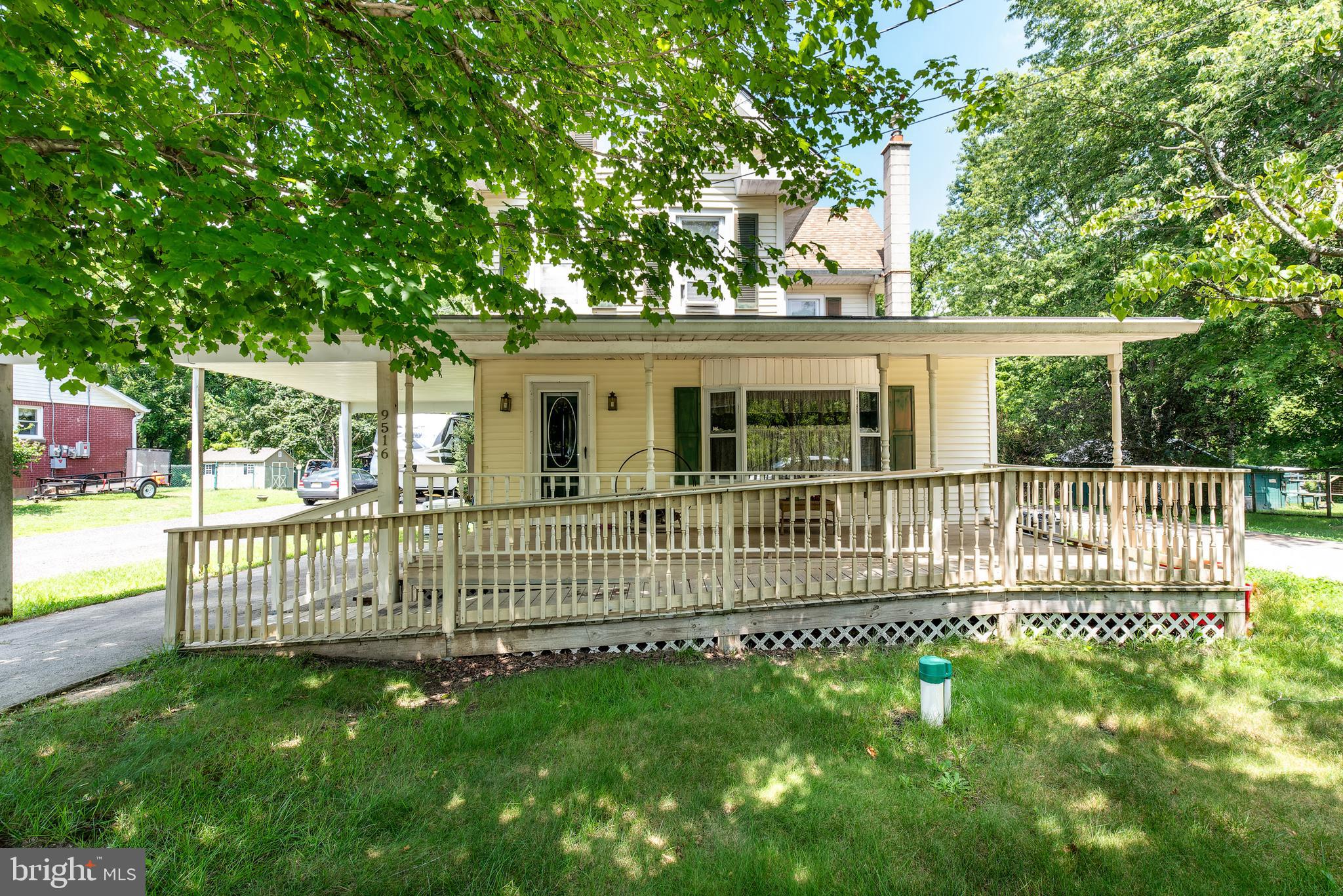 9516 Highland Street Mauricetown, NJ 08329 - Photo 2 of 53 a view of a house with a small yard and fence