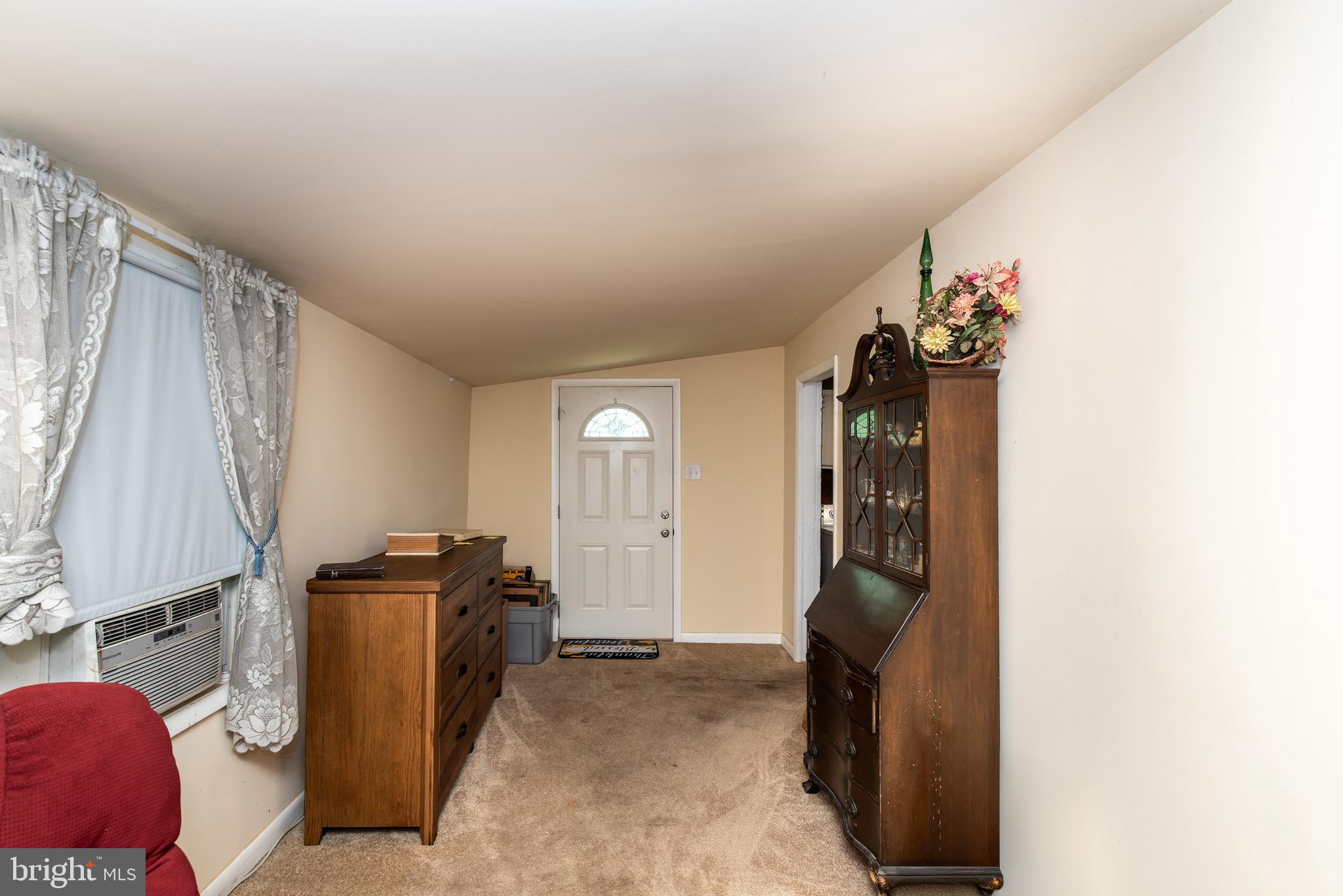 9516 Highland Street Mauricetown, NJ 08329 - Photo 28 of 53 a view of a livingroom with furniture and a window