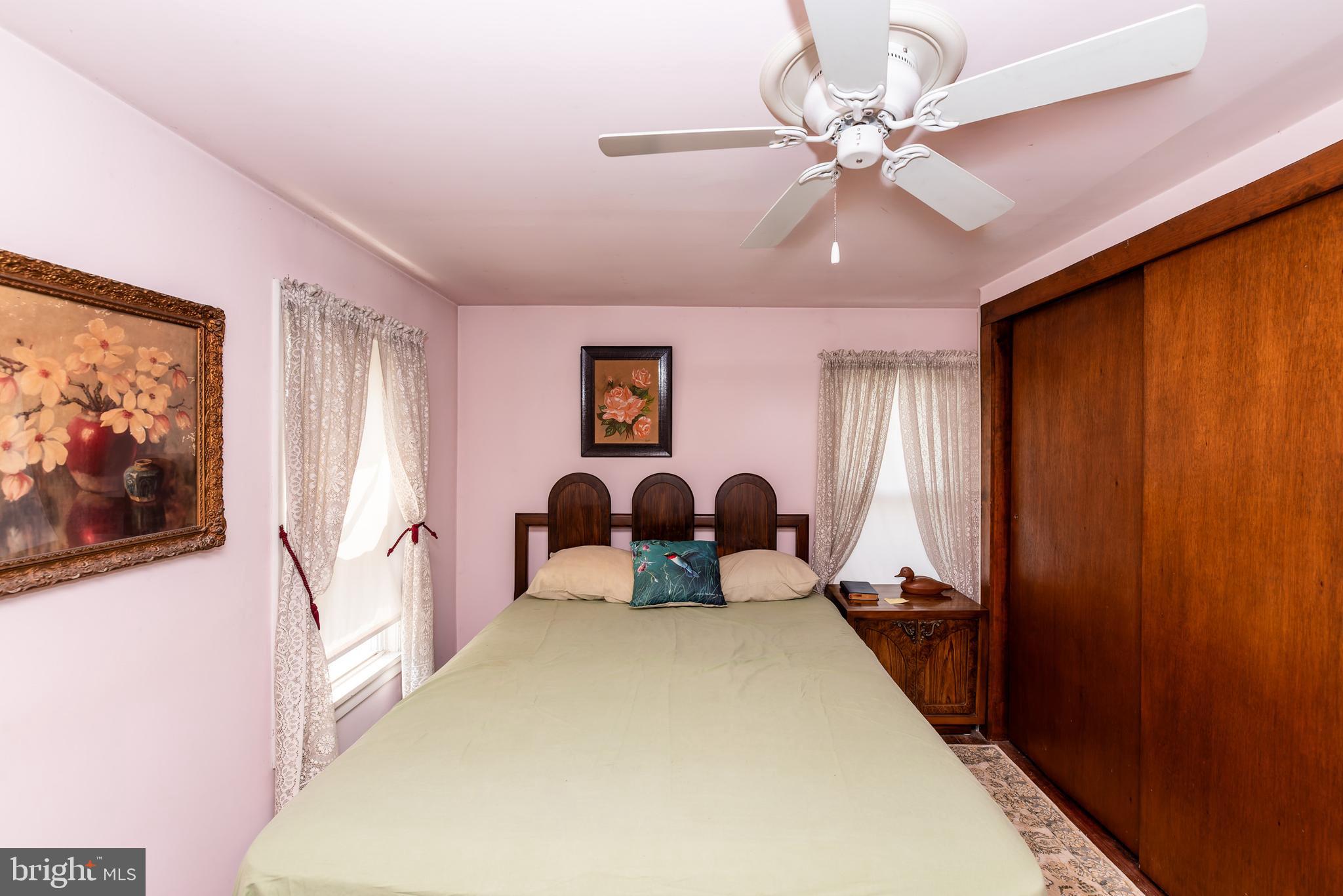 9516 Highland Street Mauricetown, NJ 08329 - Photo 32 of 53 a bedroom with furniture and window