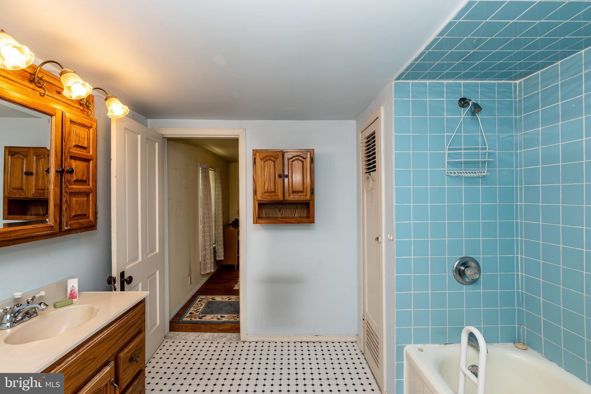 9516 Highland Street Mauricetown, NJ 08329 - Photo 39 of 53 a bathroom with a sink and shower