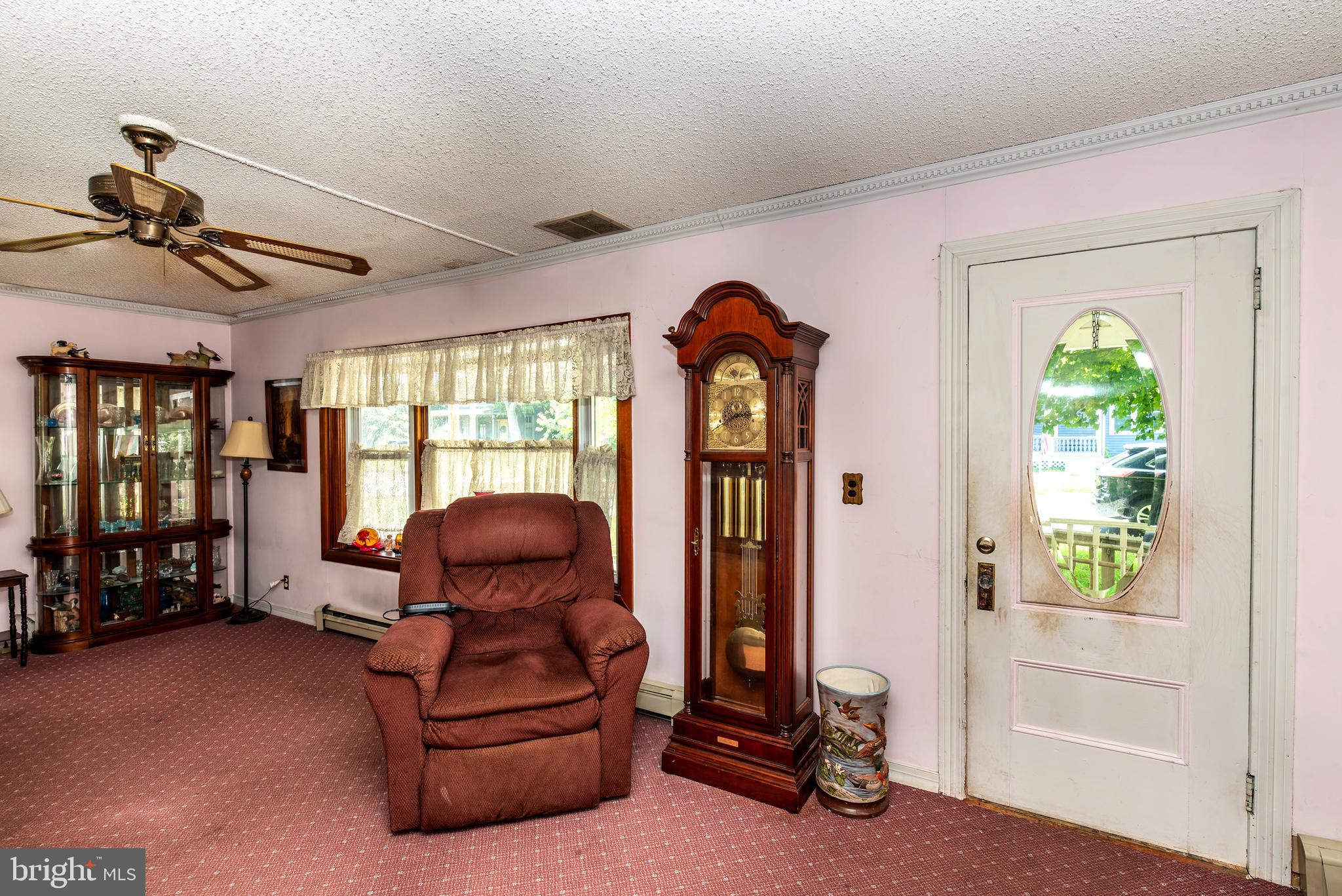 9516 Highland Street Mauricetown, NJ 08329 - Photo 9 of 53 a bedroom with furniture and a window