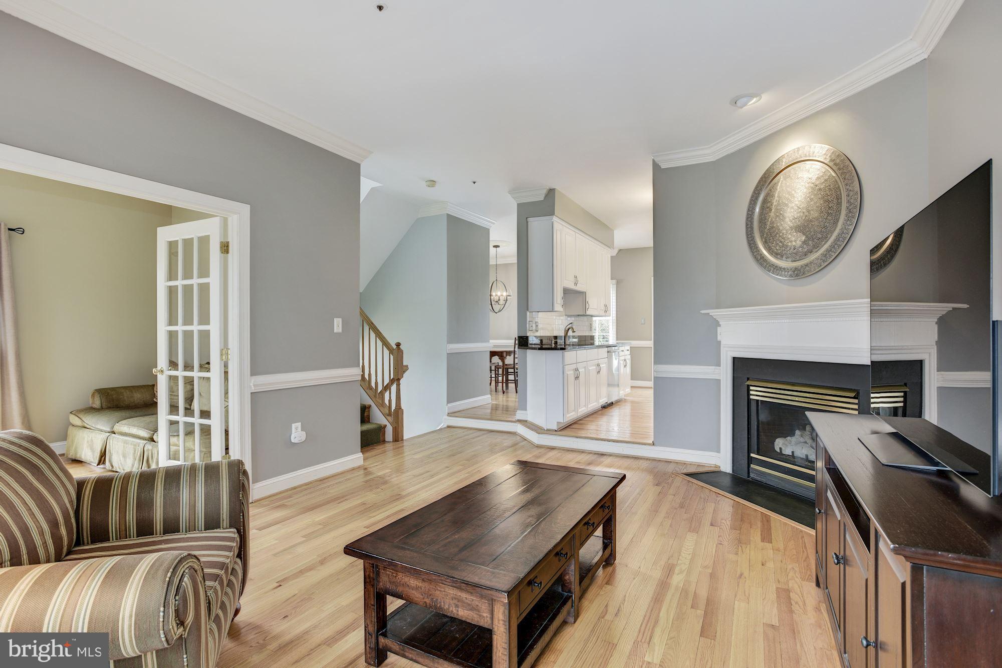 430 Tschiffely Square Road Gaithersburg, MD 20878 - Photo 8 of 51 Family Room | Fireplace | Hardwood Floors