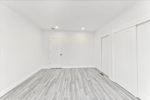 a picture of a bench in a white building