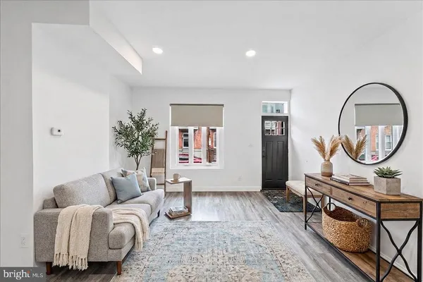 a view of entryway with wooden floor